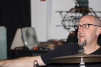 Mark grabbing cymbal