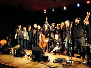 The whole band takes a bow at end of show; Ed Abbiatti in center with arm raised, me to the right next to the bearded guy in the black shirt and jeans