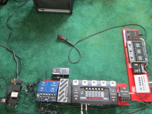 In signal path order: Audix Fireball Mic; ART MP tube preamp; Radial Tonebone ABY; Zoom G3/Digitech iStomp;  Digitech RP500; Nady 4x1 mixer; Digitech JamMan Stereo; Peavey KB2 amp